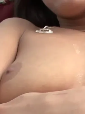 Playful whore shows off her tits while finger blasting her wet snatch.