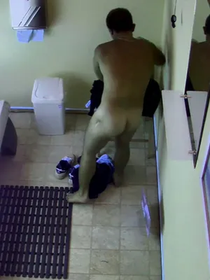 A naked cocky bastard is flaunting his goods in the fucking public Solarium, caught by the sneaky HiddenCam. Who the fuck does a striptease in a bathroom?