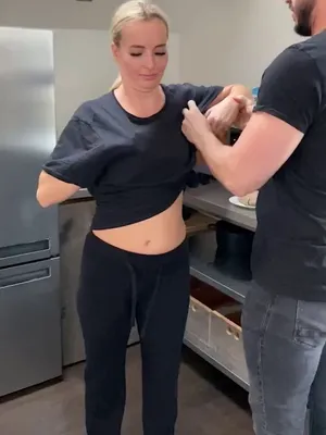 Caught this blonde babe and her hot stud mingling in the kitchen. She's serving up ponytails while he's thinking about serving up his meat. Welcome to their hilarious, horny TiktokPorn world!