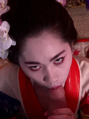 This fierce Japanese lady is enthusiastically sucking that meaty cock. Talk about talent from the land of the rising sun.