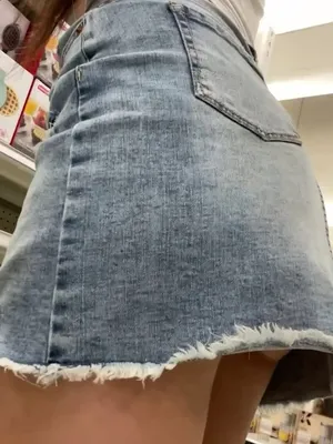 Teeny beauty flashes emerald pussy in a fucking supermarket, defiance in a denim skirt.