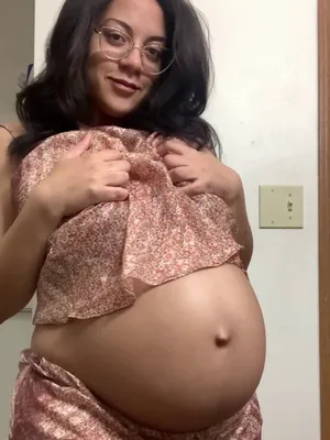 Pregnant Babe Shows Off Her Outfits and Then Gets Naked and Massages Her Pregnant Belly and Big Boobs! An Oily Pleasure!