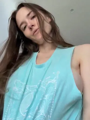 This raven-haired goddess, teasing the lens, making every fuckin’ cock beg for mercy.