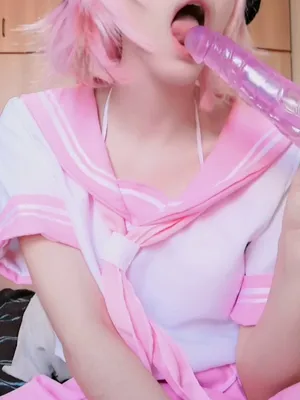 Pink hair, don’t care, sucking on this pink syringe dildo; you wanna see spit and drool, handsome?